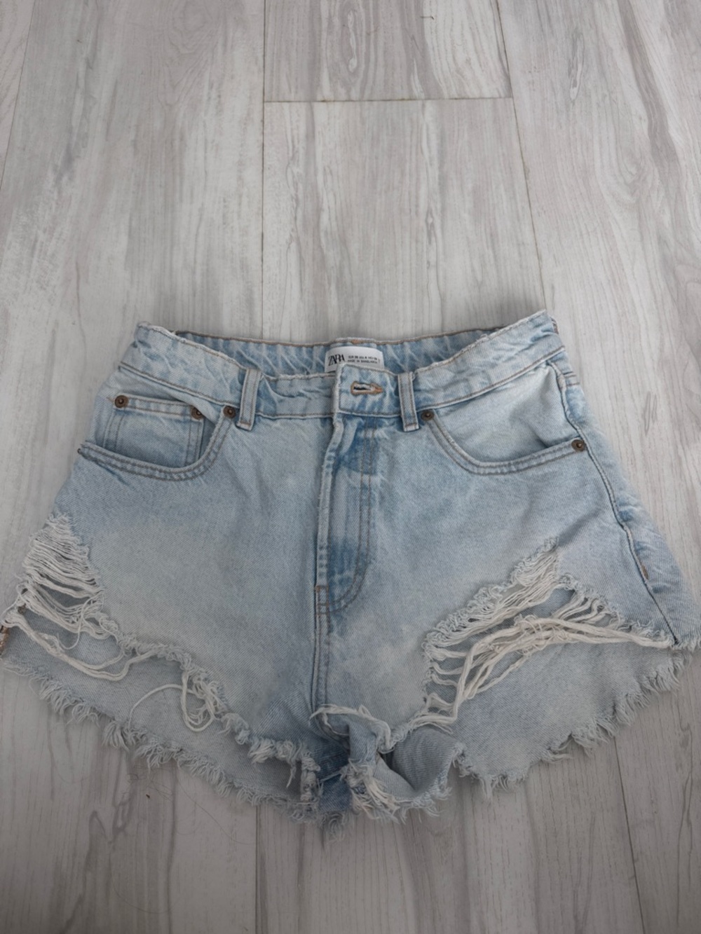 Light Wash Distressed Denim Shorts